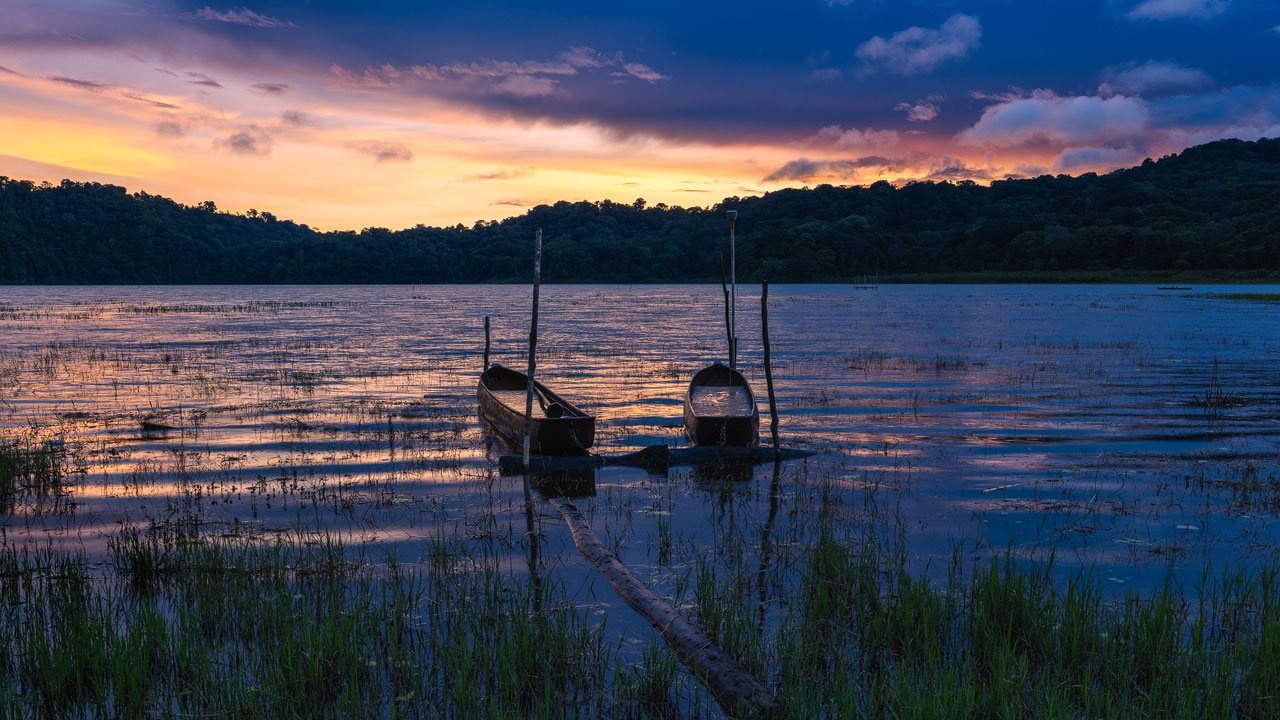 Boats at lake Tamblingan at dawn