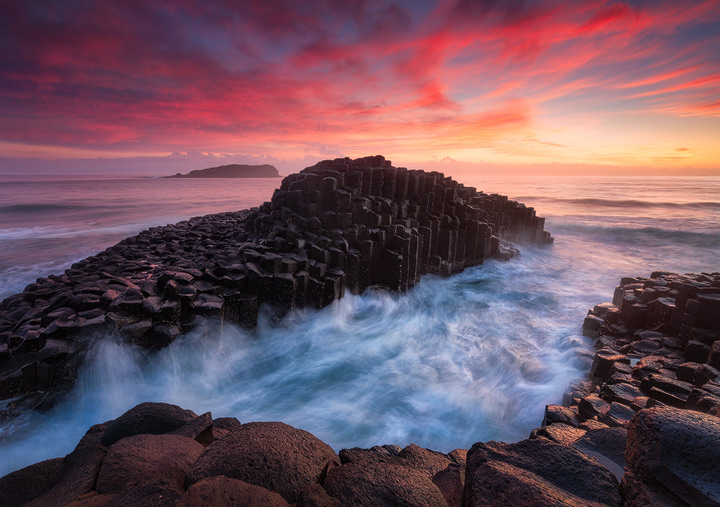 Blazing dawn over the rocks of Fingal Head Causeway