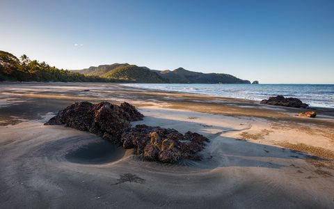 warm evening light on the palm lined beach of Cape Hillsborough