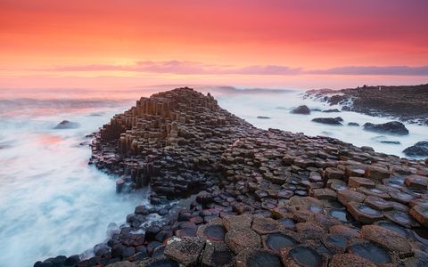 Waves crashing on the rocks of Giants Causeway