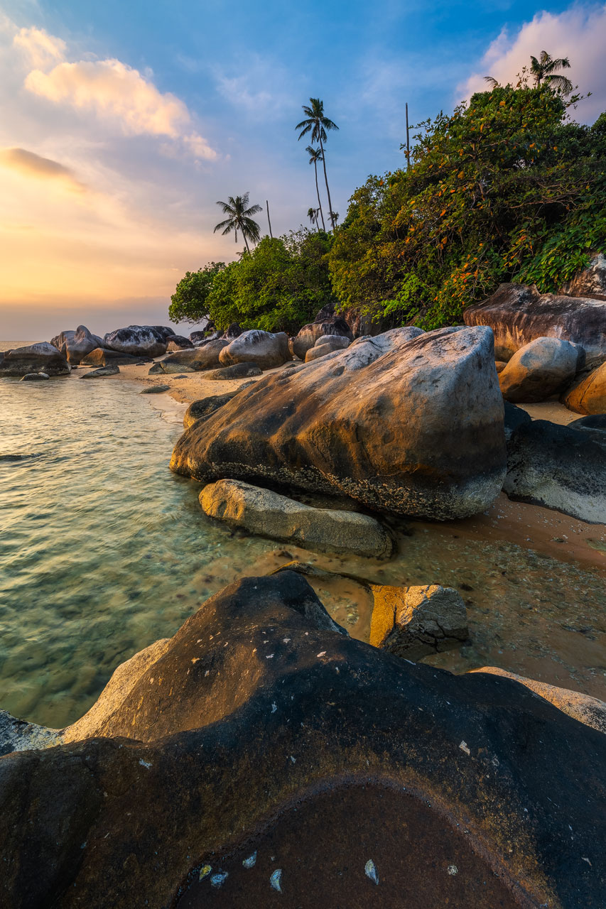 Rocks at Beach on Tioman Island glowing in warm evening Light Rocks at Beach on Tioman Island glowing in warm evening Light