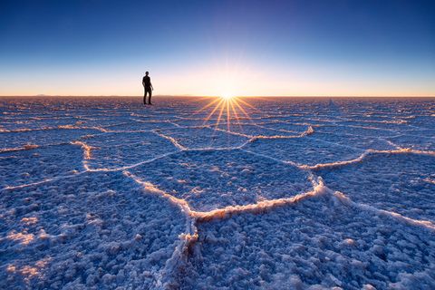 Intricate salt structures glow during sunset in Salar de Uyuni