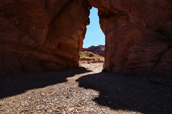 A natural arch of red rocks near Tupiza