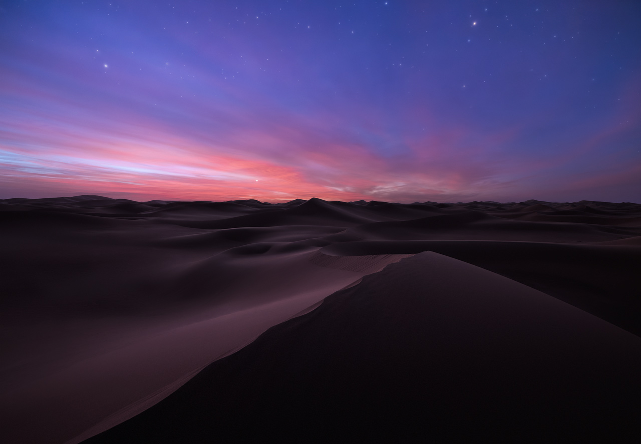 Twilight and stars over the Erg Chigaga sea of sand