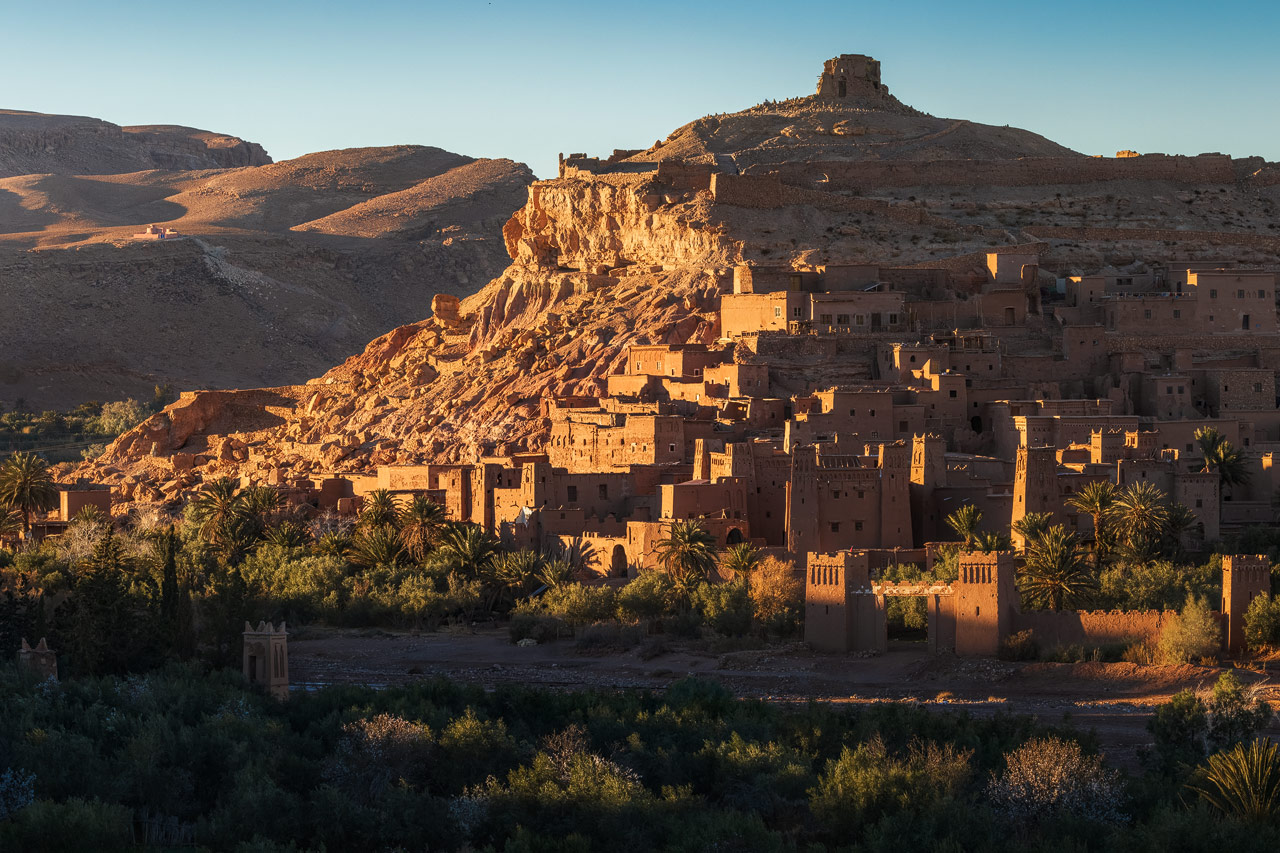 The sun sets and bathes Ait Benhaddou in golden light