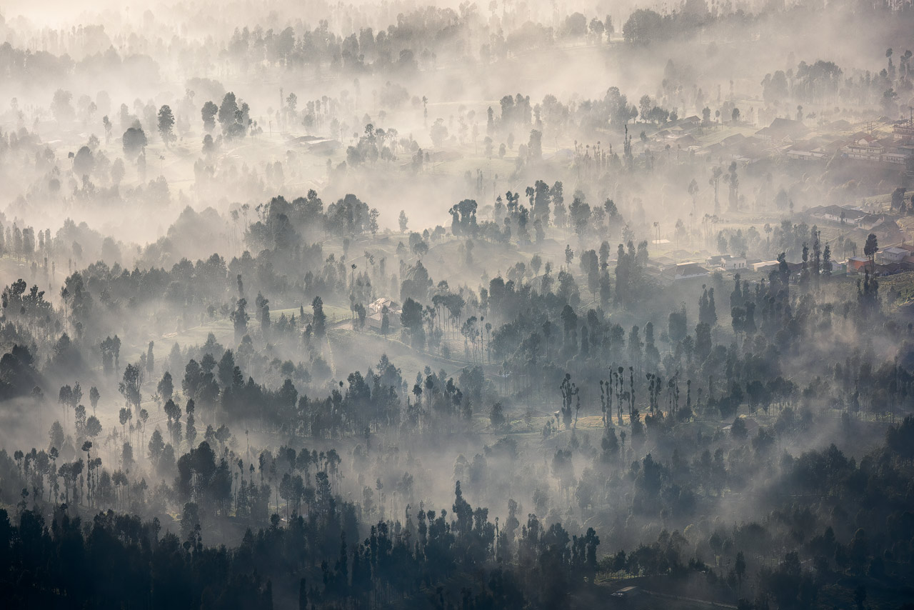 The town of Cemoro Lawang at the edge of Mount Bromo National Park on a hazy morning