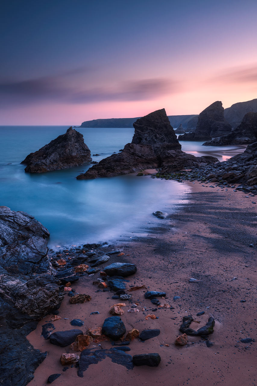 The spectacular Bedruthan Steps near Newquay during dawn.