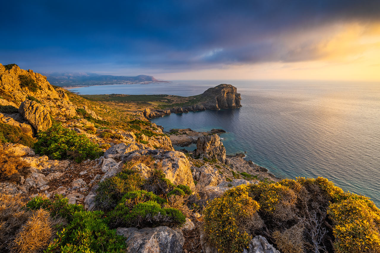 The cliffs of ancient Falasarna on Crete in warm evening light