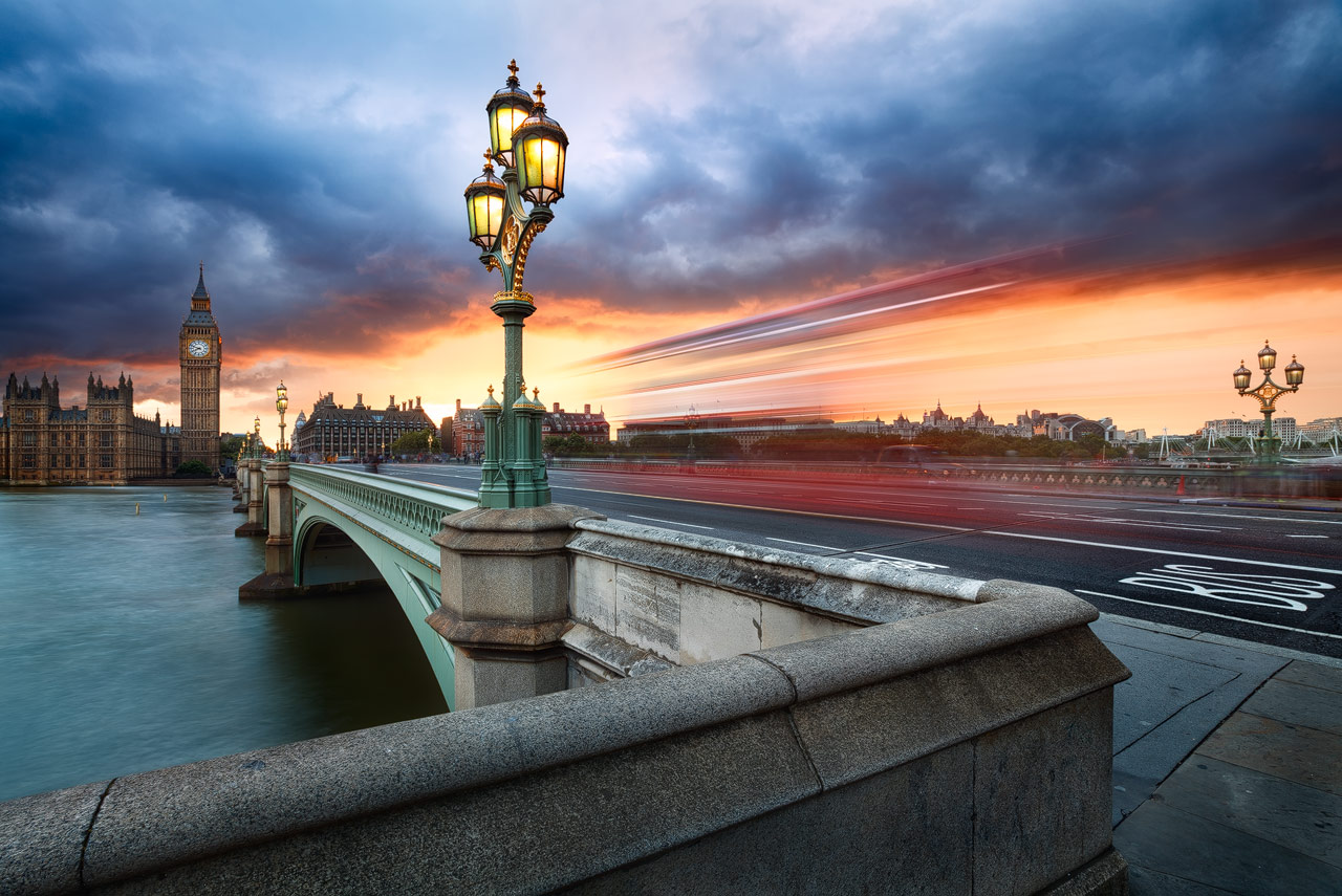 Dramatic clouds over Westminster Bridge and Big Ben during sunset