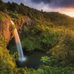 Golden sunset light on the Bridal Veil Waterfall in New Zealand