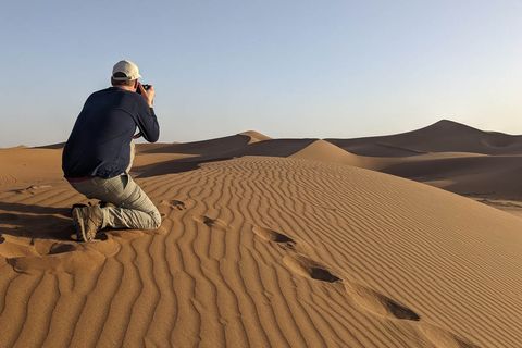 Participand of Photo Tour photographing the dunes.
